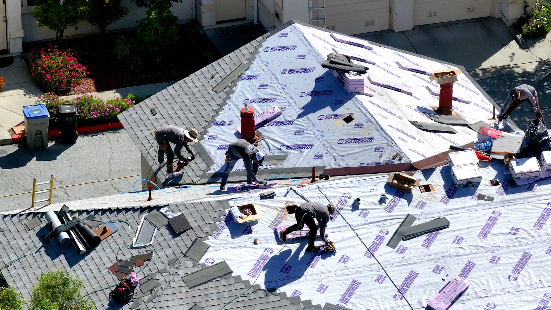 a team fixing a roof
