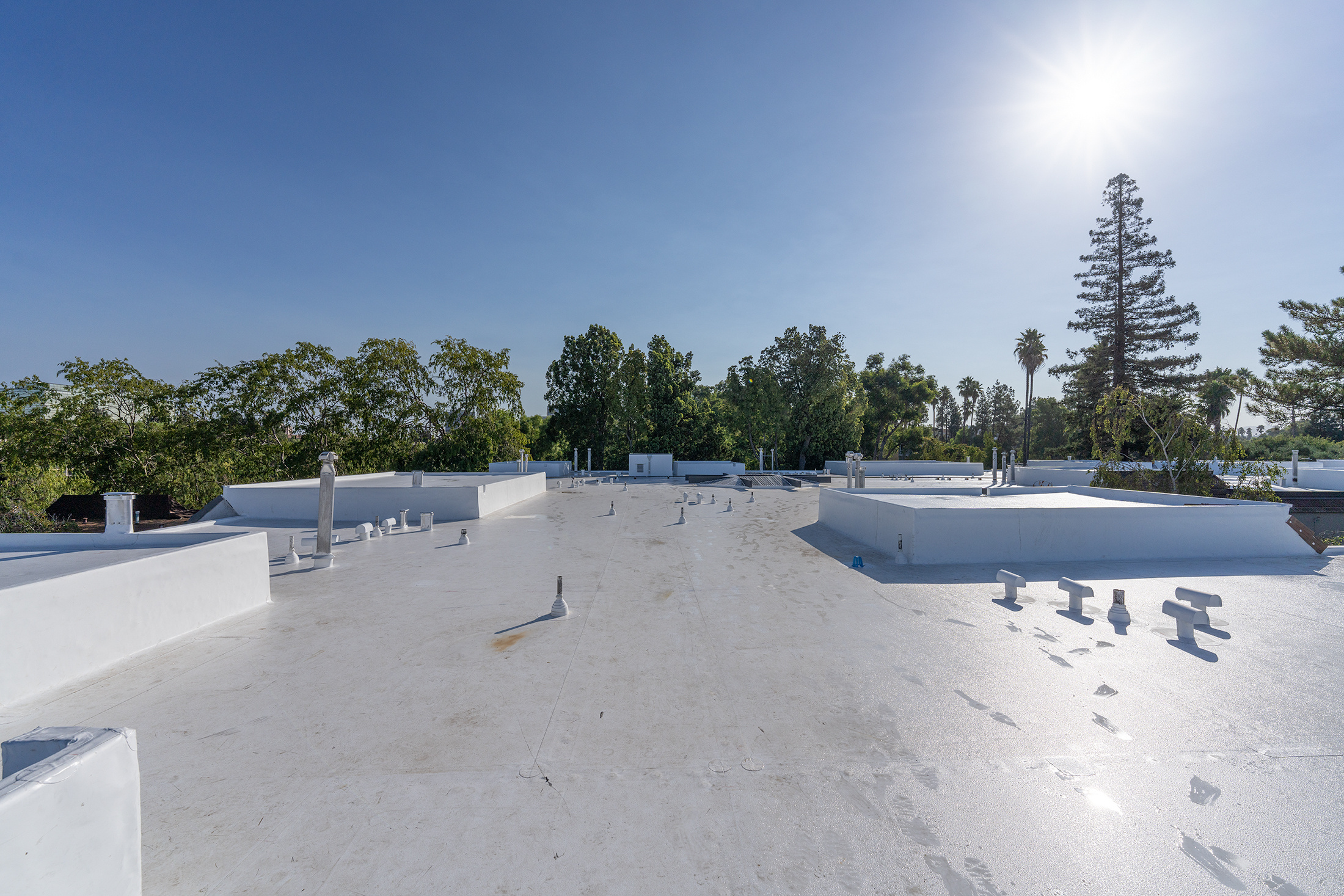 Roof Coatings: Silicone, Elastomeric, and Extending Flat Roof Life